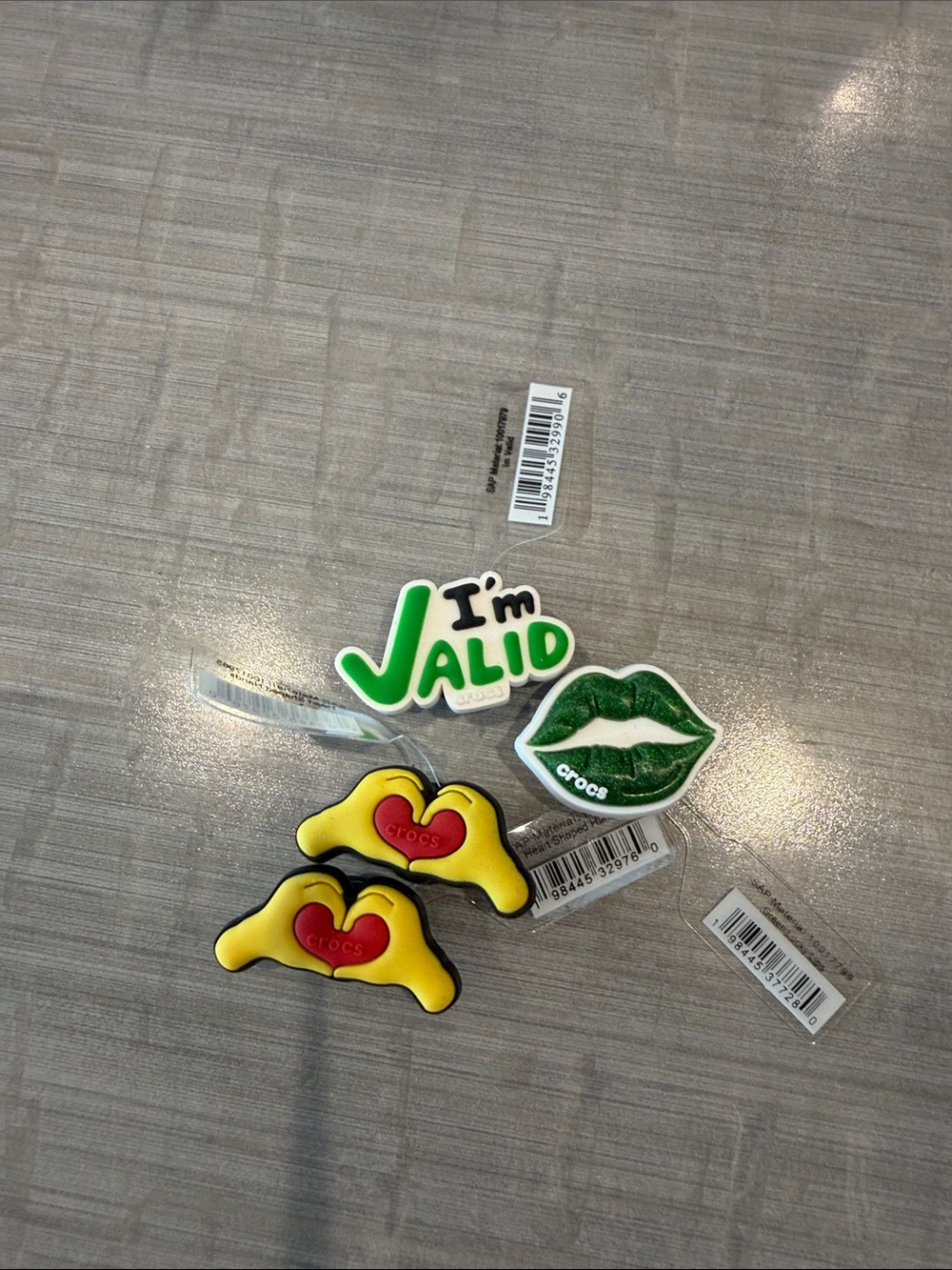 CROCS Jibbitz Pack — Green Lips, Green "I'm Valid" & Yellow Heart Hands